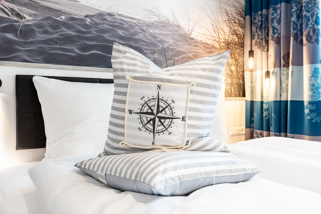 Ferienwohnung Meerblickvilla Kissen Kompass